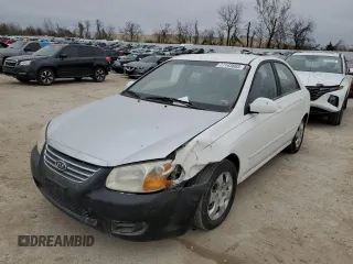 2008 Kia Spectra EX with VIN KNAFE121585499963, listed as a Copart auction lot 77143883 with 153,965 mi miles and Salvage Title. Bid and sale history available at carsss.com. Image 1.