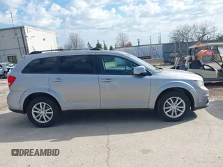 2017 Dodge Journey SXT z VIN 3C4PDDBG6HT595309, wystawiony jako IAAI lot #41918029 z przebiegiem 127 247 mil mil oraz . Historia ofert i sprzedaży dostępna na DreamBid. Obrazek 13.