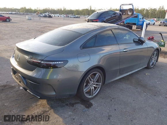 2018 Mercedes-Benz E 400 with VIN WDD1J6FB1JF021229, listed as a IAAI auction lot 42197884 with 72,011 mi miles and . Bid and sale history available at DreamBid. Image 4.