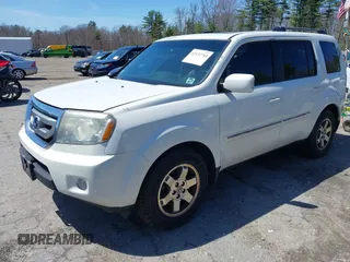 2011 Honda Pilot Touring with VIN 5FNYF4H98BB087713, listed as a IAAI auction lot 42132764 with 250,507 mi miles. Bid and sale history available at carsss.com. Image 20.