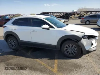 2020 Mazda CX-30 with VIN 3MVDMABL5LM119598, listed as a Copart auction lot 75895764 with 67,639 mi miles and Salvage Title. Bid and sale history available at DreamBid. Image 4.