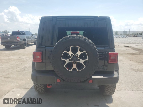2022 Jeep Wrangler Unlimited Rubicon with VIN 1C4HJXFG1NW193437, listed as a Copart auction lot 57137365 with 56,732 mi miles and Salvage title. Bid and sale history available at DreamBid. Image 6.