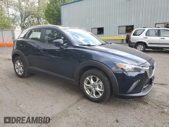 2018 Mazda CX-3 Sport z VIN JM1DKFB79J1323497, wystawiony jako Copart lot #56168875 z przebiegiem 60 284 mil mil oraz Szkoda całkowita • Salvage title. Historia ofert i sprzedaży dostępna na DreamBid. Obrazek 4.