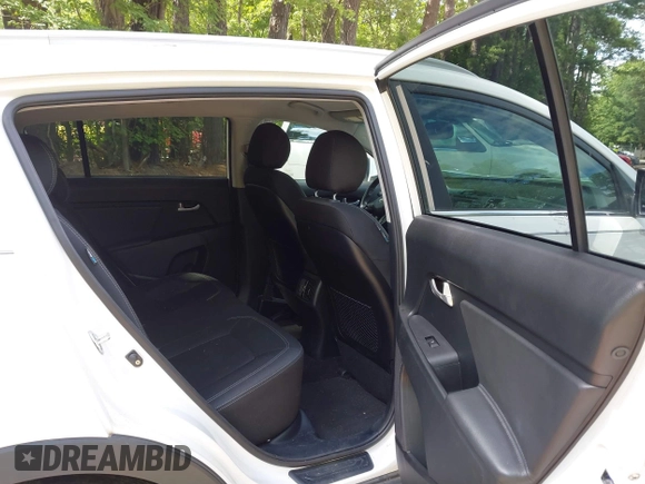 2014 Kia Sportage EX with VIN KNDPCCAC5E7658993, listed as a IAAI auction lot 42679549 with 107,658 mi miles and . Bid and sale history available at DreamBid. Image 8.