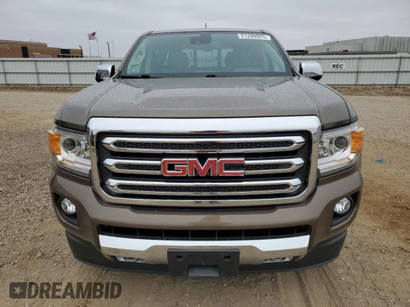 2015 GMC Canyon 4WD SLT with VIN 1GTG6CE38F1197665, listed as a Copart auction lot 51290925 with 22,223 mi miles and Salvage Title. Bid and sale history available at carsss.com. Image 5.
