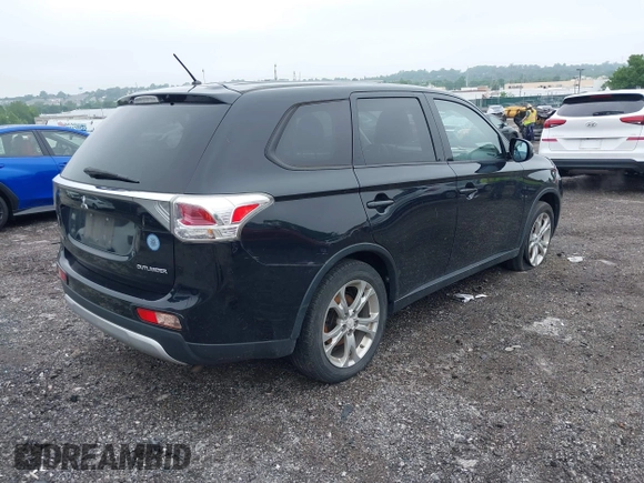2015 Mitsubishi Outlander SE with VIN JA4AD3A36FZ002806, listed as a IAAI auction lot 42516137 with Not provided miles and . Bid and sale history available at DreamBid. Image 4.