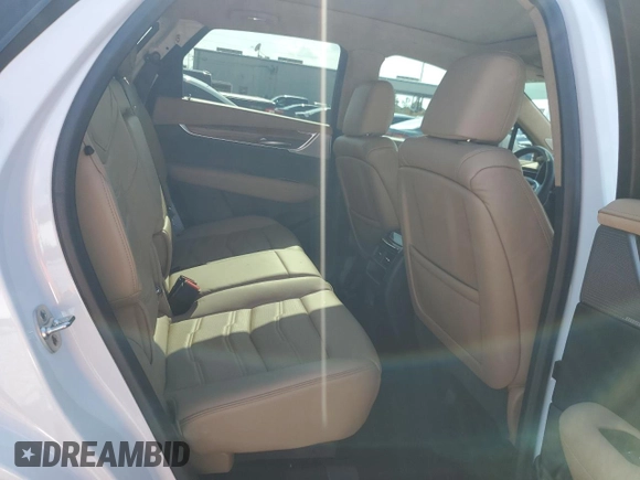 2024 Cadillac XT5 Premium Luxury AWD z VIN 1GYKNERS3RZ757814, wystawiony jako Copart lot #58976985 z przebiegiem 4 608 mil mil oraz Szkoda całkowita • Salvage title. Historia ofert i sprzedaży dostępna na DreamBid. Obrazek 11.
