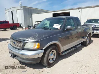 2002 Ford F-150 XL with VIN 1FTRX07L92KC81256, listed as a IAAI auction lot 41765831 with 149,506 mi miles. Bid and sale history available at carsss.com. Image 2.