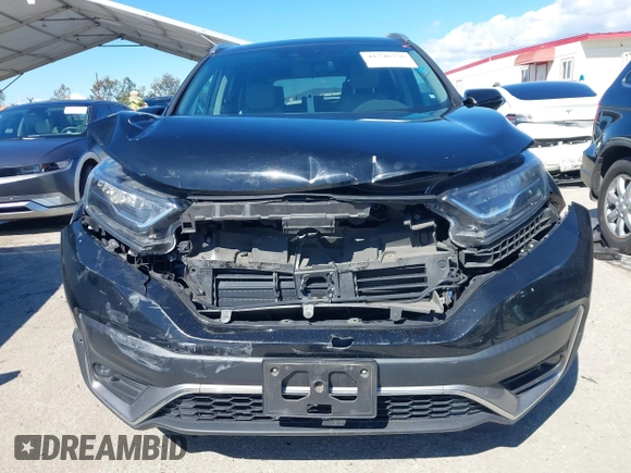 2020 Honda CR-V Touring with VIN 2HKRW2H94LH653538, listed as a IAAI auction lot 41740336 with 45,346 mi miles and . Bid and sale history available at DreamBid. Image 12.