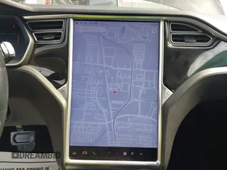 2014 Tesla Model S 60 z VIN 5YJSA1H1XEFP44397, wystawiony jako IAAI lot #42140917 z przebiegiem 136 515 mil mil oraz . Historia ofert i sprzedaży dostępna na DreamBid. Obrazek 19.