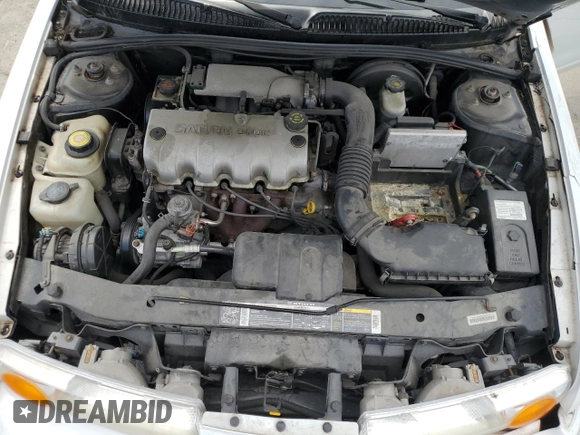 2002 Saturn SL z VIN 1G8ZH52842Z136222, wystawiony jako Copart lot #53687125 z przebiegiem 133 327 mil mil oraz Szkoda całkowita • Salvage title. Historia ofert i sprzedaży dostępna na DreamBid. Obrazek 11.