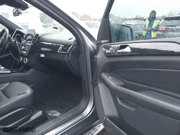 2017 Mercedes-Benz GLE with VIN 4JGDA5HB9HA992609, listed as a IAAI auction lot 41724638 with 205,921 mi miles. Bid and sale history available at carsss.com. Image 5.