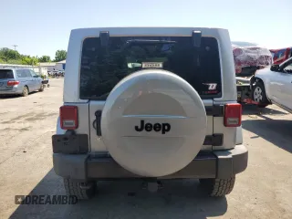 2014 Jeep Wrangler Unlimited Sahara with VIN 1C4BJWEG8EL236951, listed as a Copart auction lot 61046575 with 146,642 mi miles and Salvage title. Bid and sale history available at DreamBid. Image 6.