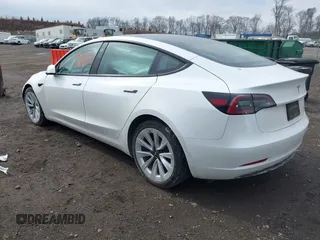 2023 Tesla Model 3 Long Range with VIN 5YJ3E1EB8PF600291, listed as a IAAI auction lot 41651156 with 37,055 mi miles and . Bid and sale history available at DreamBid. Image 3.