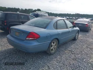 2006 Ford Taurus SE z VIN 1FAFP53U96A241825, wystawiony jako IAAI lot #42286654 z przebiegiem 205 136 mil mil oraz . Historia ofert i sprzedaży dostępna na DreamBid. Obrazek 4.