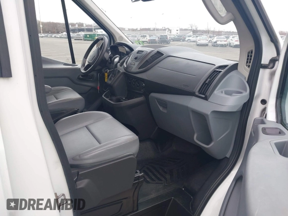 2016 Ford Transit Cargo with VIN 1FTYR1CM5GKA27058, listed as a IAAI auction lot 41753527 with 112,824 mi miles and . Bid and sale history available at DreamBid. Image 5.