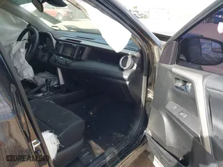2017 Toyota RAV4 XLE with VIN 2T3RFREV9HW567801, listed as a IAAI auction lot 41053316 with 103,267 mi miles. Bid and sale history available at carsss.com. Image 5.