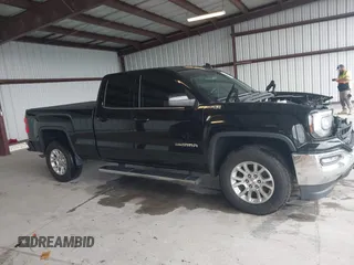 2017 GMC Sierra 1500 SLE z VIN 1GTV2MEC2HZ324763, wystawiony jako IAAI lot #42234082 z przebiegiem 106 984 mil mil oraz . Historia ofert i sprzedaży dostępna na DreamBid. Obrazek 13.