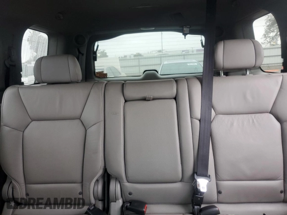 2011 Honda Pilot Touring z VIN 5FNYF4H94BB046303, wystawiony jako Copart lot #58017515 z przebiegiem 118 384 mil mil oraz Szkoda całkowita • Salvage title. Historia ofert i sprzedaży dostępna na DreamBid. Obrazek 10.