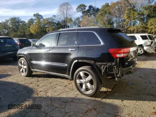 2011 Jeep Grand Cherokee Overland with VIN 1J4RS6GG7BC646610, listed as a Copart auction lot 79931614 with 188,601 mi miles and Salvage Title. Bid and sale history available at DreamBid. Image 2.