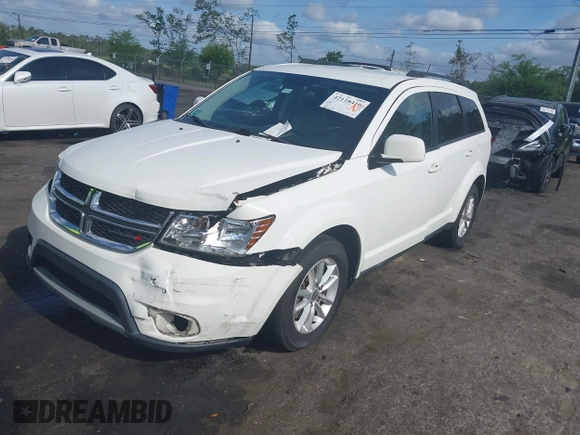2015 Dodge Journey SXT with VIN 3C4PDCBG0FT653857, listed as a IAAI auction lot 42128410 with 182,960 mi miles and . Bid and sale history available at DreamBid. Image 17.