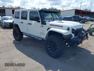 2020 Jeep Wrangler Unlimited Sahara with VIN 1C4HJXEN7LW213459, listed as a IAAI auction lot 41502047 with 40,816 mi miles. Bid and sale history available at carsss.com. Image 1.