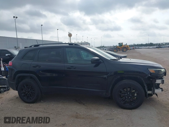 2023 Jeep Cherokee Altitude Lux with VIN 1C4PJMMB9PD114936, listed as a IAAI auction lot 42159214 with 59,525 mi miles. Bid and sale history available at carsss.com. Image 14.