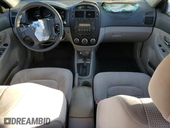 2008 Kia Spectra EX with VIN KNAFE121685507522, listed as a Copart auction lot 57908235 with 143,894 mi miles and Salvage title. Bid and sale history available at DreamBid. Image 8.