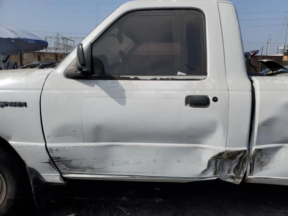 2002 Ford Ranger XL Fleet with VIN 1FTYR10E02PA63992, listed as a Copart auction lot 74987714 with 188,731 mi miles and Salvage Title. Bid and sale history available at carsss.com. Image 7.