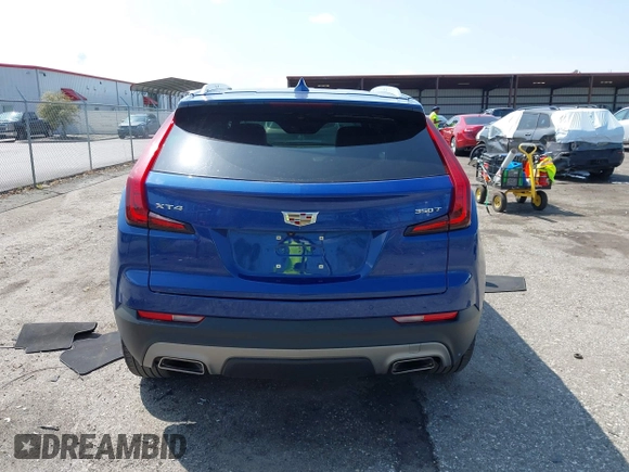 2023 Cadillac XT4 FWD Premium Luxury z VIN 1GYFZCR43PF104796, wystawiony jako IAAI lot #41931695 z przebiegiem 12 666 mil mil oraz . Historia ofert i sprzedaży dostępna na DreamBid. Obrazek 16.
