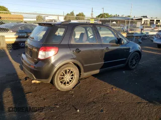 2009 Suzuki SX4 Man Touring Pkg AWD with VIN JS2YB417195101117, listed as a Copart auction lot 71102744 with 137,707 mi miles and Salvage Title. Bid and sale history available at carsss.com. Image 3.