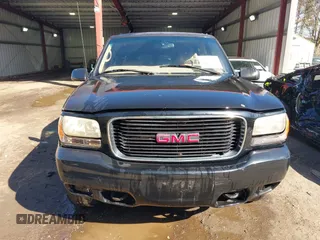 2000 GMC Denali with VIN 1GKEK13R1YR129862, listed as a IAAI auction lot 41833054 with 223,811 mi miles. Bid and sale history available at carsss.com. Image 12.