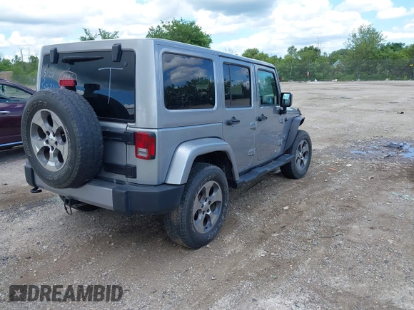 2018 Jeep Wrangler Unlimited Sahara with VIN 1C4BJWEGXJL806832, listed as a IAAI auction lot 42605892 with 90,535 mi miles and . Bid and sale history available at DreamBid. Image 4.