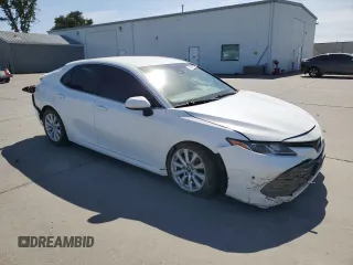 2018 Toyota Camry LE с VIN 4T1B11HK5JU073663, выставлен на аукционе Copart как лот 55656575 с пробегом 100 578 миль миль и Списание • Salvage title. История ставок и продаж доступна на DreamBid. Изображение 4.