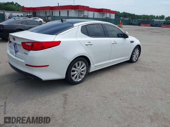 2015 Kia Optima EX with VIN 5XXGN4A77FG452747, listed as a IAAI auction lot 42772766 with 97,243 mi miles and . Bid and sale history available at DreamBid. Image 4.
