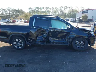 2018 Honda Ridgeline RTL-E z VIN 5FPYK3F78JB013981, wystawiony jako IAAI lot #41844954 z przebiegiem 101 794 mil mil oraz . Historia ofert i sprzedaży dostępna na DreamBid. Obrazek 12.