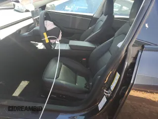 2024 Tesla Model 3 with VIN 5YJ3E1EA8RF755854, listed as a Copart auction lot 45986995 with 7,374 mi miles and Salvage Title. Bid and sale history available at DreamBid. Image 7.