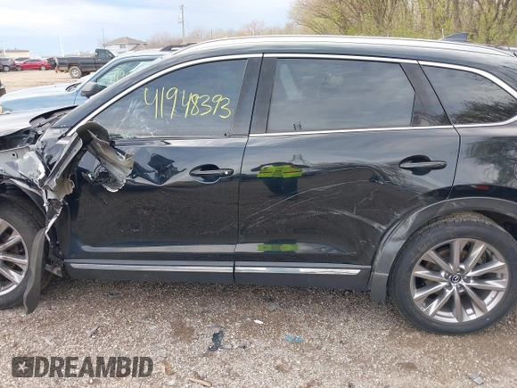 2020 Mazda CX-9 Grand Touring with VIN JM3TCBDY3L0419049, listed as a IAAI auction lot 41948393 with 70,163 mi miles and . Bid and sale history available at DreamBid. Image 14.