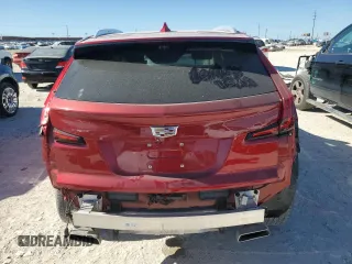2022 Cadillac XT4 FWD Premium Luxury with VIN 1GYFZCR43NF154997, listed as a Copart auction lot 81942214 with 22,697 mi miles and Salvage title. Bid and sale history available at DreamBid. Image 6.