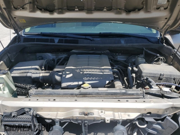 2009 Toyota Tundra z VIN 5TFDV54189X087718, wystawiony jako Copart lot #58004065 z przebiegiem 126 210 mil mil oraz Szkoda całkowita • Salvage title. Historia ofert i sprzedaży dostępna na DreamBid. Obrazek 11.