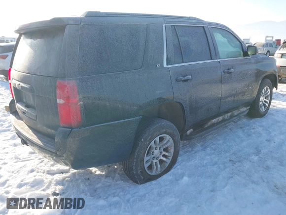 2020 Chevrolet Tahoe LT with VIN 1GNSKBKC9LR309818, listed as a IAAI auction lot 41420268 with 131,823 mi miles and . Bid and sale history available at DreamBid. Image 4.