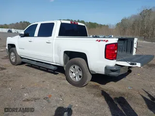 2015 Chevrolet Silverado 1500 LT with VIN 3GCUKREC7FG358672, listed as a IAAI auction lot 41735598 with 197,446 mi miles. Bid and sale history available at carsss.com. Image 3.