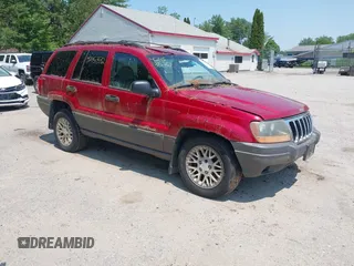 2001 Jeep Grand Cherokee Laredo with VIN 1J4GW48S11C720055, listed as a IAAI auction lot 42453532 with 158,486 mi miles and . Bid and sale history available at DreamBid. Image 1.