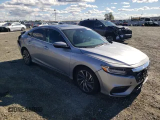 2021 Honda Insight Touring with VIN 19XZE4F99ME010173, listed as a Copart auction lot 47144315 with 80,990 mi miles and Salvage Title. Bid and sale history available at carsss.com. Image 4.