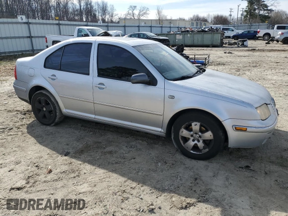 2004 Volkswagen Jetta GLS with VIN 3VWSR69M24M123449, listed as a Copart auction lot 48115325 with 302,443 mi miles and Salvage title. Bid and sale history available at DreamBid. Image 4.