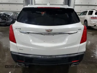 2017 Cadillac XT5 Luxury AWD z VIN 1GYKNDRSXHZ286169, wystawiony jako Copart lot #56516535 z przebiegiem 132 301 mil mil oraz Szkoda całkowita • Salvage title. Historia ofert i sprzedaży dostępna na DreamBid. Obrazek 6.