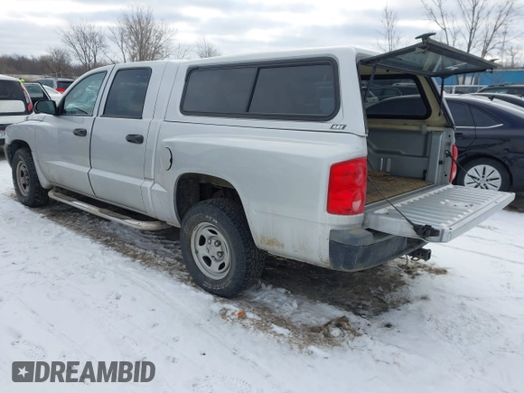 2006 Dodge Dakota ST with VIN 1D7HE28K56S636387, listed as a IAAI auction lot 41305723 with 104,821 mi miles and . Bid and sale history available at carsss.com. Image 3.