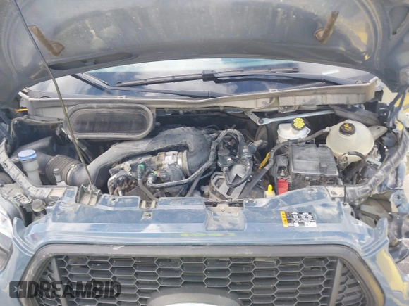 2021 Ford Transit Cargo with VIN 1FTBR3X89MKA54791, listed as a IAAI auction lot 42515449 with 57,847 mi miles and . Bid and sale history available at DreamBid. Image 10.