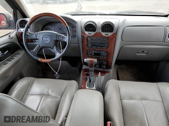 2007 GMC Envoy Denali with VIN 1GKET63M472231291, listed as a Copart auction lot 77020984 with 157,364 mi miles and Salvage Title. Bid and sale history available at DreamBid. Image 8.