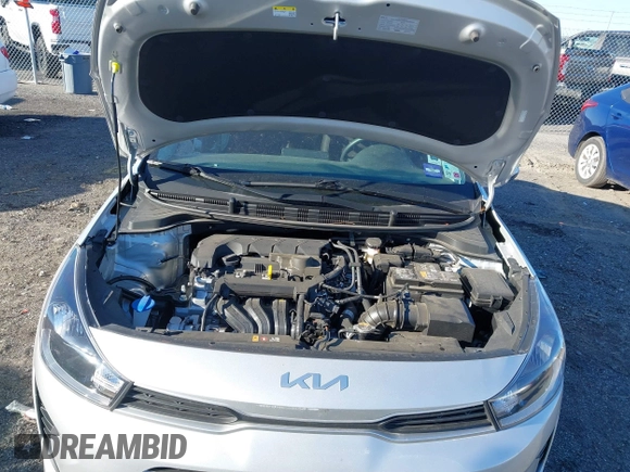 2023 Kia Rio LX with VIN 3KPA24ADXPE606463, listed as a IAAI auction lot 41728523 with 8,909 mi miles and . Bid and sale history available at DreamBid. Image 10.